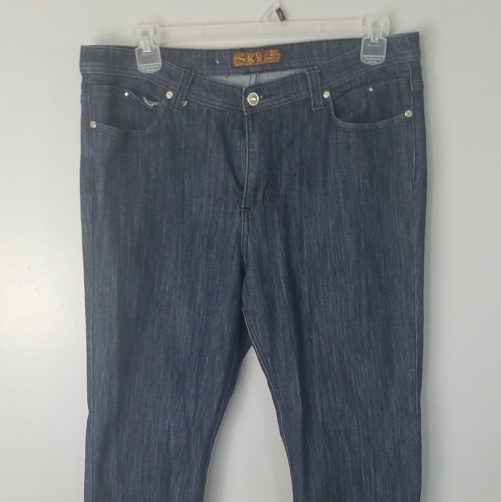 Blue jeans with ripples on the bottom